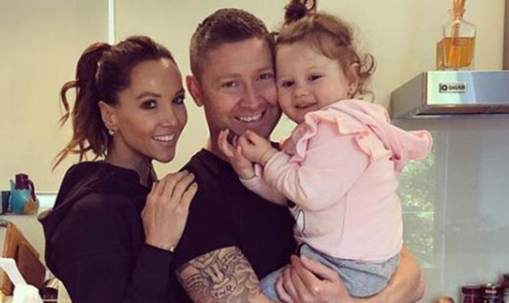 Michael & Kyly Clarke spark baby rumours after the exes were spotted having a family holiday together