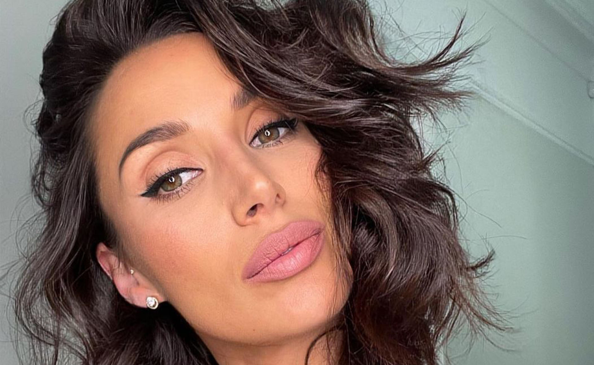 Snezana Wood debuts facial tattoos in surprise video – and the results are impressive