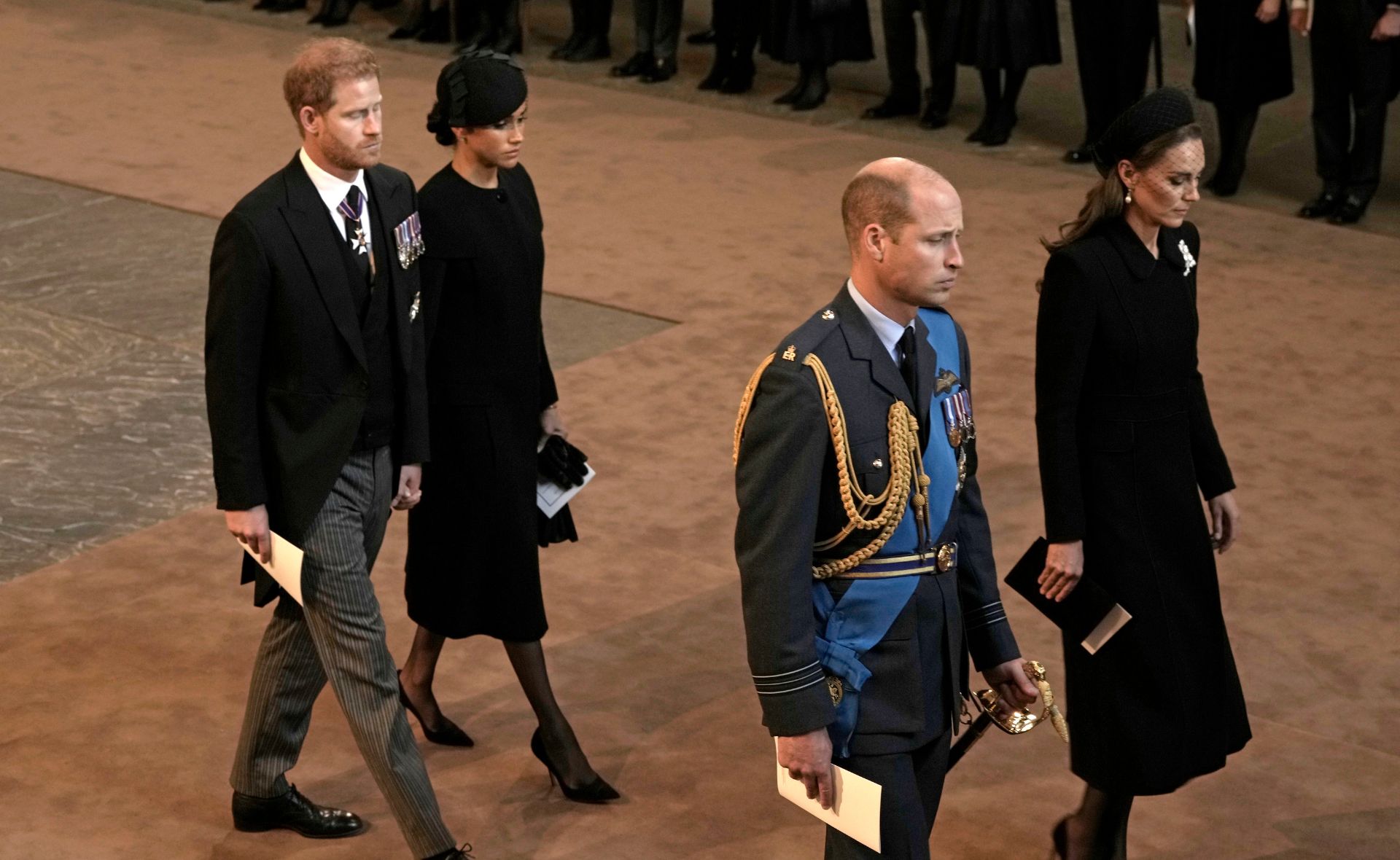 Prince Harry and Meghan Markle reunite with the British royal family to receive the Queen’s coffin