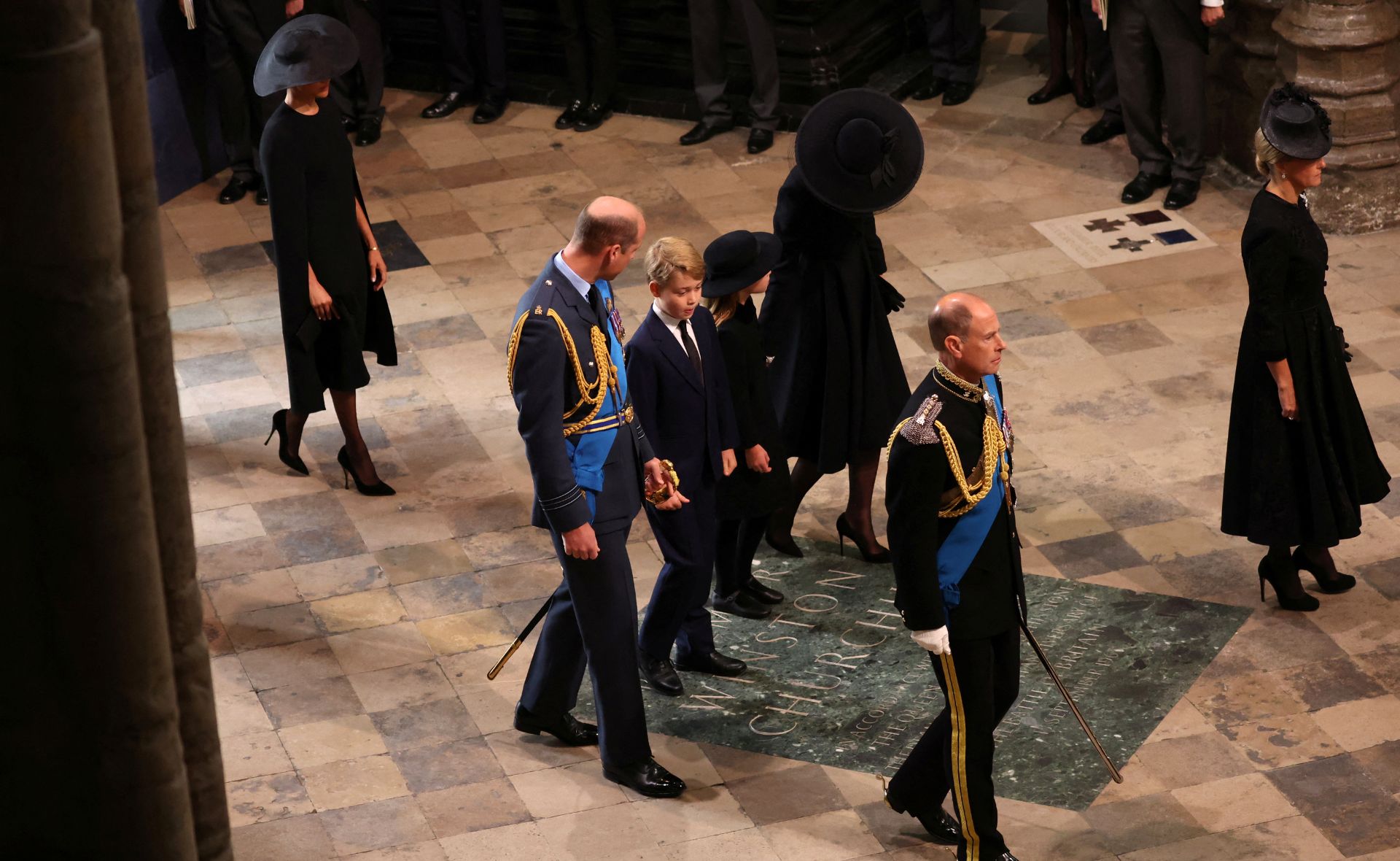 Prince George and Princess Charlotte join royal family as they walk solemnly behind The Queen’s coffin