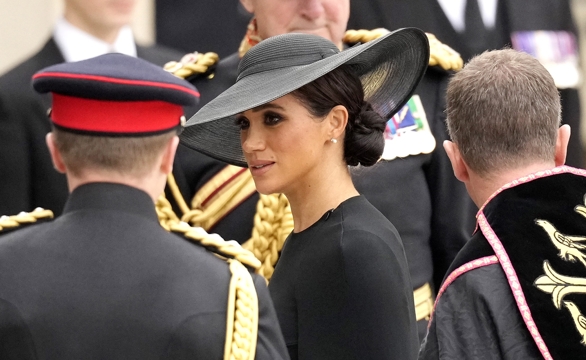 Prince Harry and Meghan Markle turn heads as they arrive at Queen’s Funeral