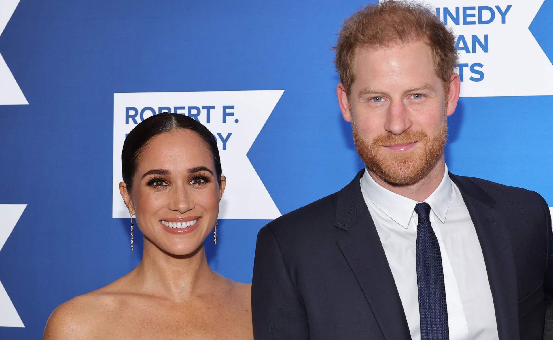 Meghan Markle and Prince Harry strut the blue carpet with Princess Di’s heirloom