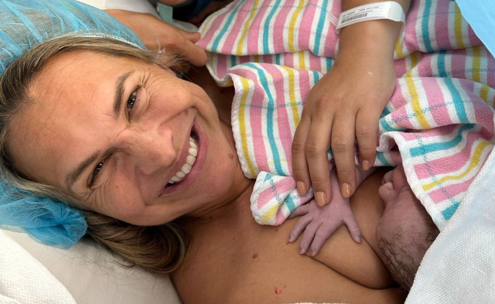 Australian Olympic swimmer Libby Trickett has given birth to her fourth child