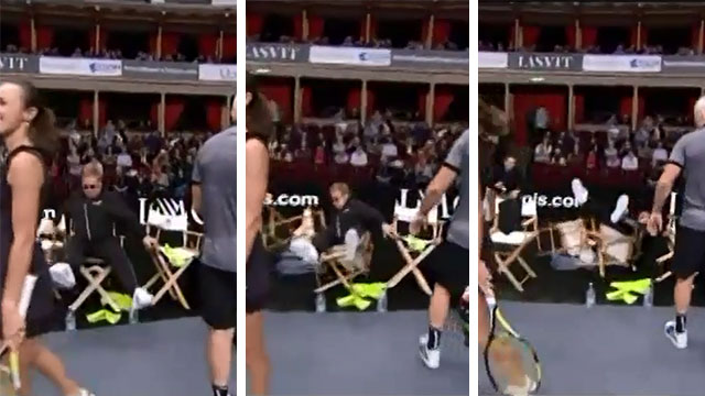 Elton John falls off chair at Tennis