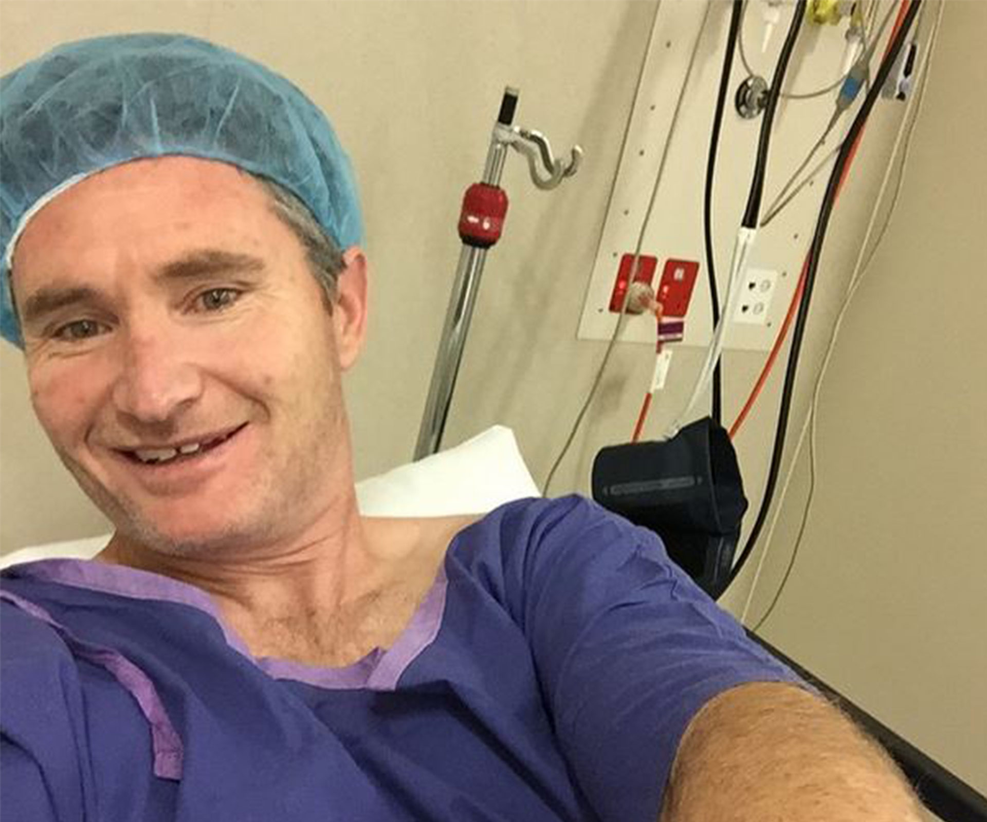 “Hey ho let’s go!” Dave Hughes posts a selfie from hospital bed ahead of his vasectomy