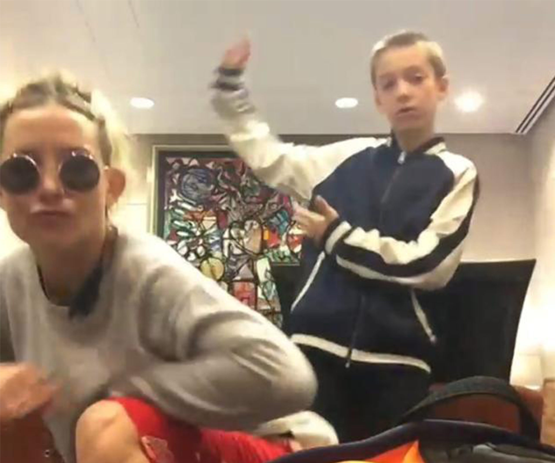 Kate Hudson and son Ryder’s hilarious “Trap Queen” dance video in an airport lounge
