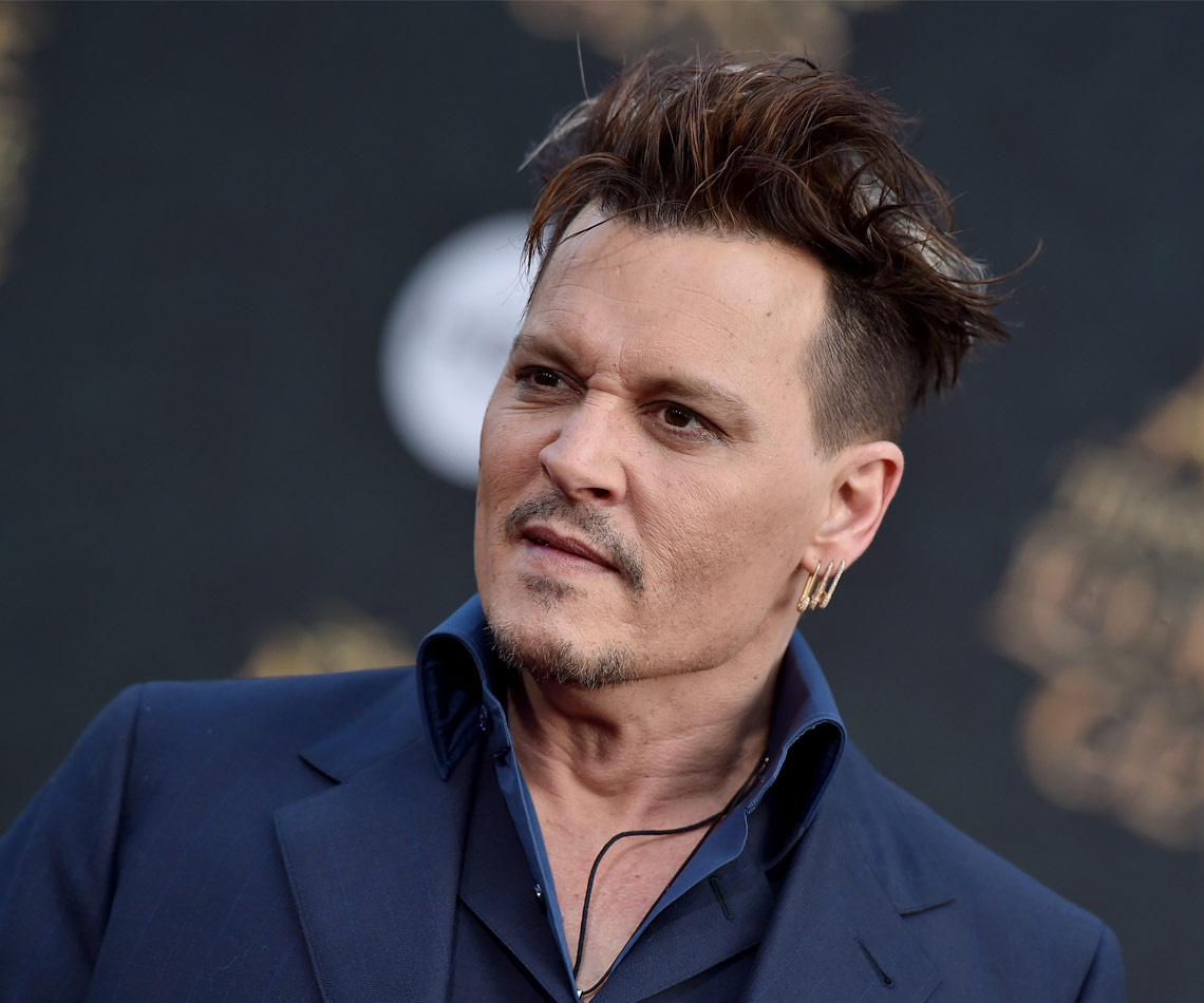 Johnny Depp disses Amber Heard with new tattoo
